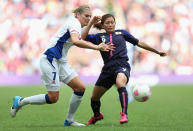 LONDON, ENGLAND - AUGUST 06: Corine Franco of France battles with Nahomi Kawasumi of Japan during the Women's Football Semi Final match between France and Japan on Day 10 of the London 2012 Olympic Games at Wembley Stadium on August 6, 2012 in London, England. (Photo by Julian Finney/Getty Images)