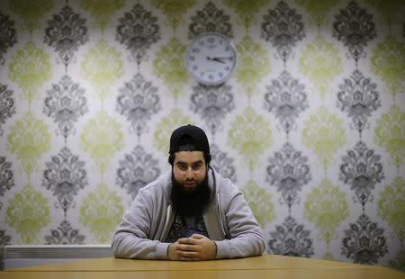 Waseem Iqbal poses for a photograph in Birmingham, central England November 20, 2014. REUTERS/Darren Staples