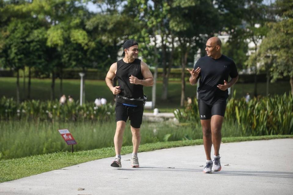 Despite muscle cramps mid-run, Shirkouhi managed to endure all 47km along with some assistance from Siva. — Picture by Ahmad Zamzahuri