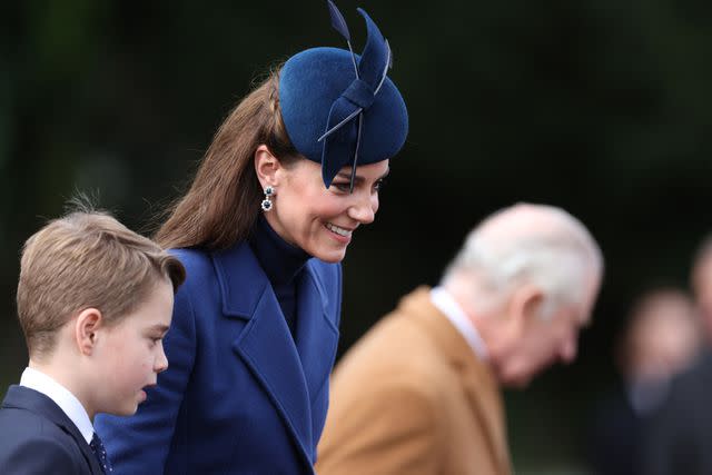 <p>Adrian Dennis / AFP via Getty</p> Prince George, Kate Middleton and King Charles after attending the Christmas Day service at St Mary Magdalene Church on December 25, 2023.