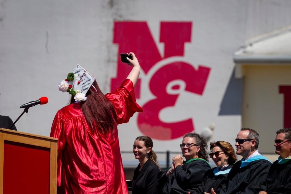 Speaker Destynee Simpson takes a selfie with the Class of 2023 during North Eugene High School’s June 10 commencement ceremony.
