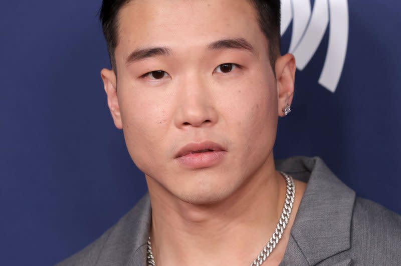 Joel Kim Booster will co-host "Chrissy & Dave Dine Out" with Chrissy Teigen and David Chang. File Photo by Greg Grudt/UPI