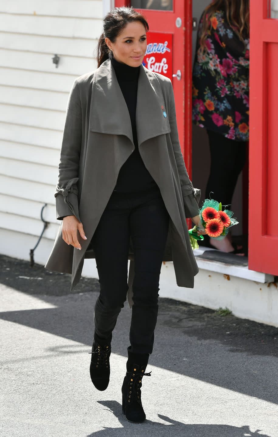 <p>Harry and Meghan met with a young New Zealanders to discuss mental health while in Wellington. For the daytime outing, the Duchess wore Club Monaco's Ellayne Trench over a sweater by Jac + Jack with <a href="https://outlanddenim.ca/products/harriet-in-black-1?variant=12431424815201" rel="nofollow noopener" target="_blank" data-ylk="slk:Outland Denim's Harriet jeans.;elm:context_link;itc:0;sec:content-canvas" class="link ">Outland Denim's Harriet jeans.</a> Meghan also wore lace-up boots by Stuart Weitzman</p><p><a class="link " href="https://go.redirectingat.com?id=74968X1596630&url=https%3A%2F%2Fshop.nordstrom.com%2Fs%2Fstuart-weitzman-veruka-lace-up-boot-women%2F4900880&sref=https%3A%2F%2Fwww.townandcountrymag.com%2Fstyle%2Ffashion-trends%2Fg3272%2Fmeghan-markle-preppy-style%2F" rel="nofollow noopener" target="_blank" data-ylk="slk:SHOP NOW;elm:context_link;itc:0;sec:content-canvas">SHOP NOW </a><em>Veruka Lace-Up Boot by Stuart Weitzman, $698</em></p>