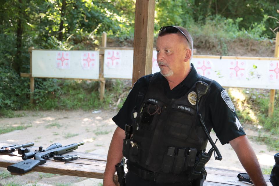 Sgt. Dan Hall of the Raisin Township Police Department addresses people at a youth shooting event Saturday, Aug. 6, 2022, at the Lenawee County Conservation League.