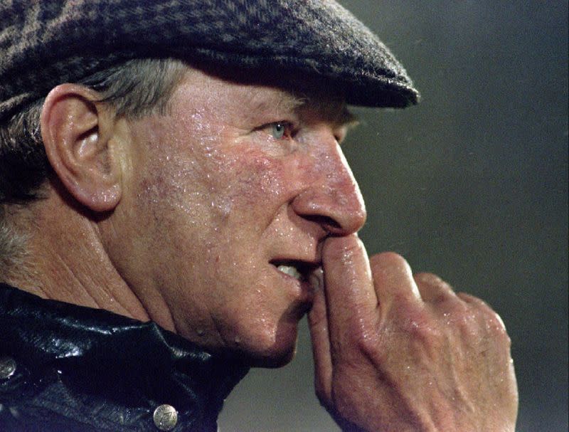 FILE PHOTO: Ireland's British coach Jack Charlton bites his nails during the last minutes of an European Championship Group Six qualifying match against Portugal at Lisbon's Light stadium, in Lisbon