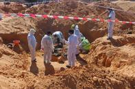 Libyan investigators find more mass graves in recaptured city