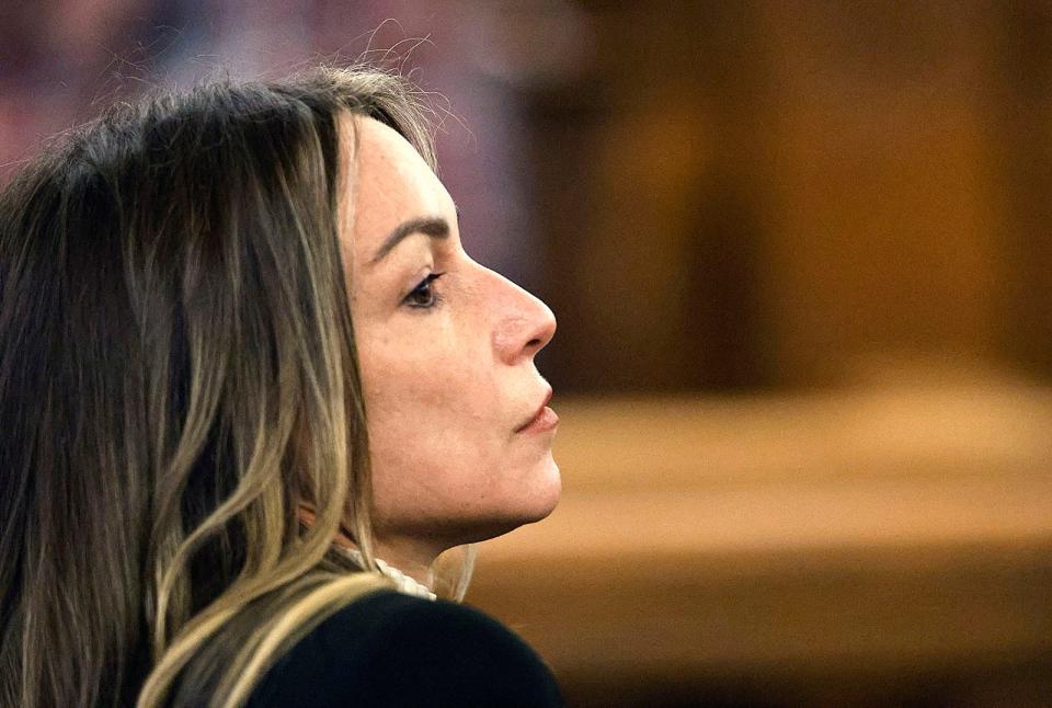 Karen Read looks on during a break in jury selection for her murder trial in Dedham Superior Court on Wednesday, April 24, 2024.