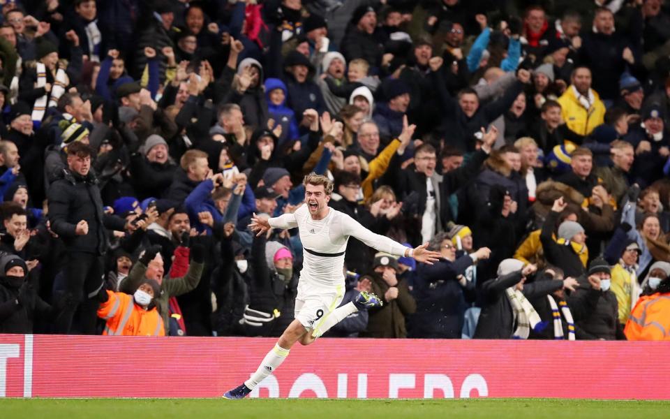 Patrick Bamford of Leeds United celebrates after scoring their side's second goal during the Premier League match between Leeds United and Brentford at Elland Road on December 05, 2021 in Leeds, England. - GETTY IMAGES