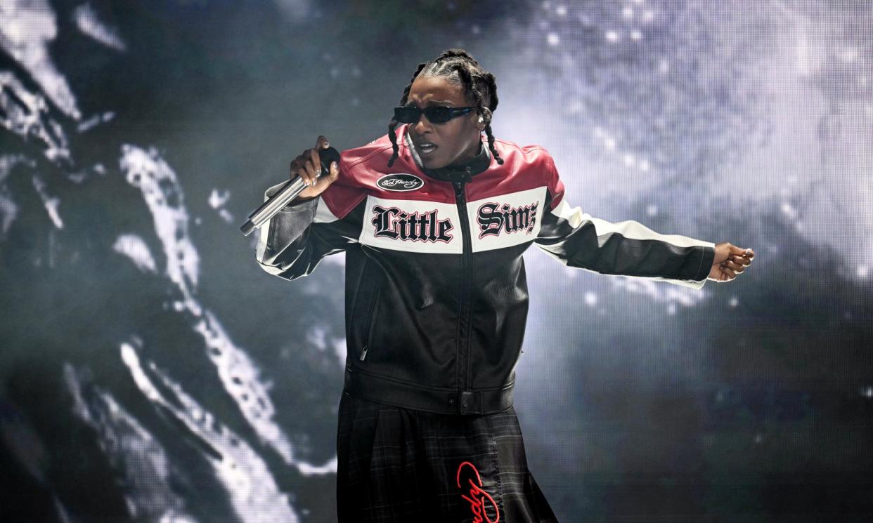 <span>Smashing it … Little Simz performs on the Pyramid stage.</span><span>Photograph: Oli Scarff/AFP/Getty Images</span>