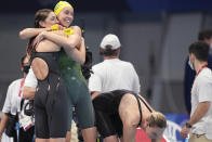 Australian women's 4x100m freestyle relay team celebrate after winning the gold medal at the 2020 Summer Olympics, Sunday, July 25, 2021, in Tokyo, Japan. (AP Photo/Matthias Schrader)