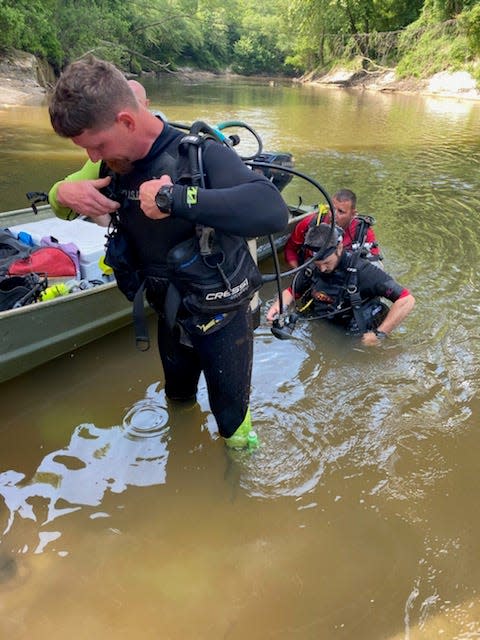 Jones County Sheriff's Department along with Jones County Search and Recovery Dive Team, Mississippi Department of Wildlife, Fisheries and Parks and Jones County Emergency Management was at the U.S. 590 bridge in Jones County, Miss., conducting underwater scuba diving operations, surface water searches and bank searches Thursday, May 19, 2022.