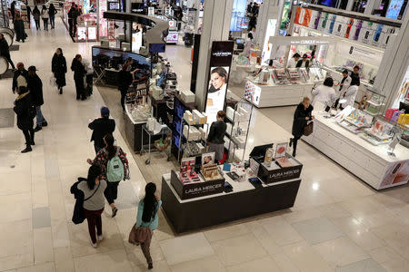 FILE PHOTO: People shop at Macy's Department store in New York City, U.S., March 11, 2019. REUTERS/Brendan McDermid/File Photo