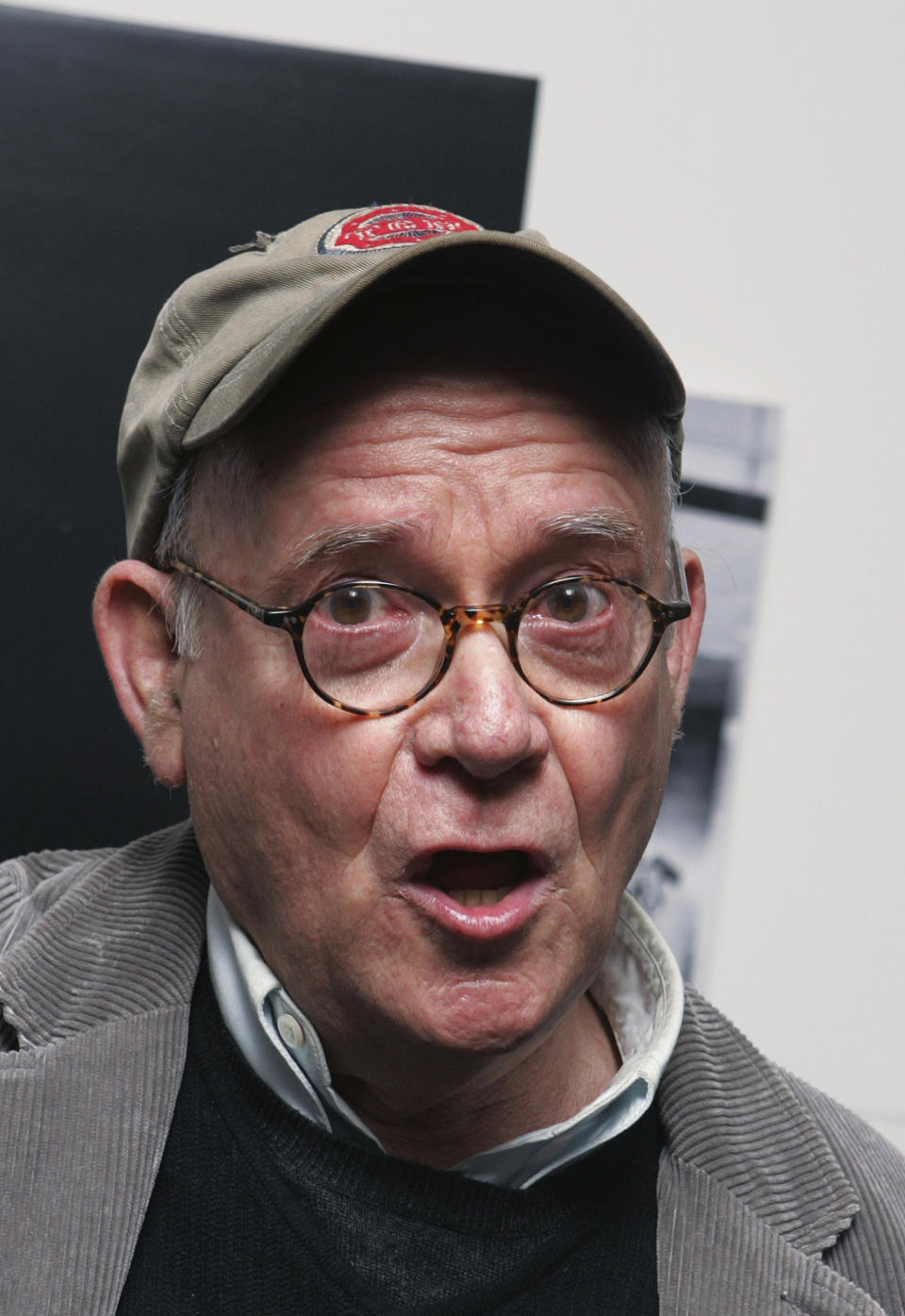 FILE - In this Nov. 28, 2006, file photo, actor Buck Henry arrives to the private screening of the "Children of Men" at the Museum of Modern Art in New York. Henry, the versatile writer, director and character actor who co-wrote and appeared in "The Graduate'' has died in Los Angeles. He was 89. Henry's wife, Irene Ramp, told The Washington Post that his death was due to a heart attack. (AP Photo/Dima Gavrysh, File)