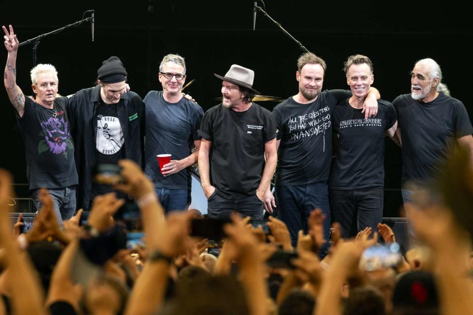 <p>Jim Bennett/Getty</p> Mike McCready (left), Josh Klinghoffer, Stone Gossard, Eddie Vedder, Jeff Ament, Matt Cameron and Boom Gaspar of Pearl Jam in Austin, Texas on Sept. 18, 2023