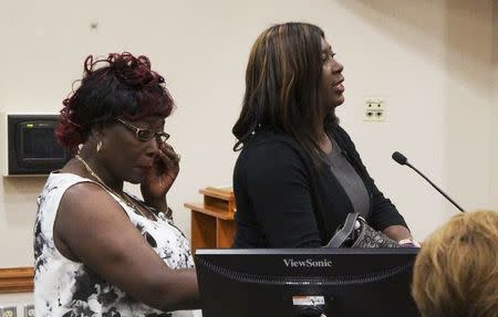 Learlean Rahming, 63, wipes tears as her family member (R) asks the elected state officials overseeing the clemency process to restore her voting rights where her request was denied in Tallahassee, Florida, U.S. on September 21, 2016. Picture taken on September 21, 2016. REUTERS/Letitia Stein