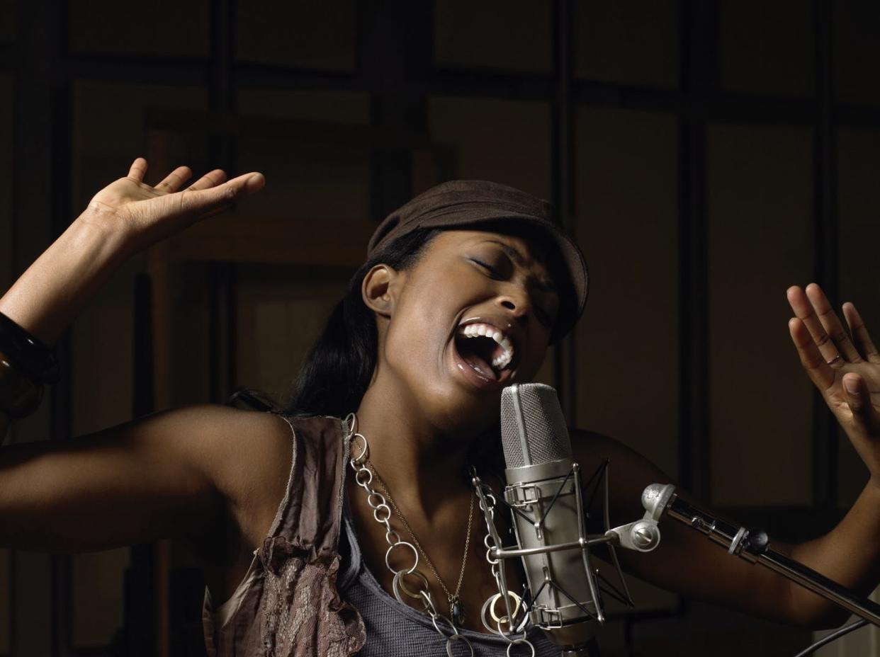 <span class="caption">If the range of a song is good for you, you're much more likely to enjoy and find ease in singing it.</span> <span class="attribution"><a class="link " href="https://media.gettyimages.com/photos/young-woman-singing-picture-id74075546?s=2048x2048" rel="nofollow noopener" target="_blank" data-ylk="slk:Image Source/Getty Images;elm:context_link;itc:0;sec:content-canvas">Image Source/Getty Images</a></span>