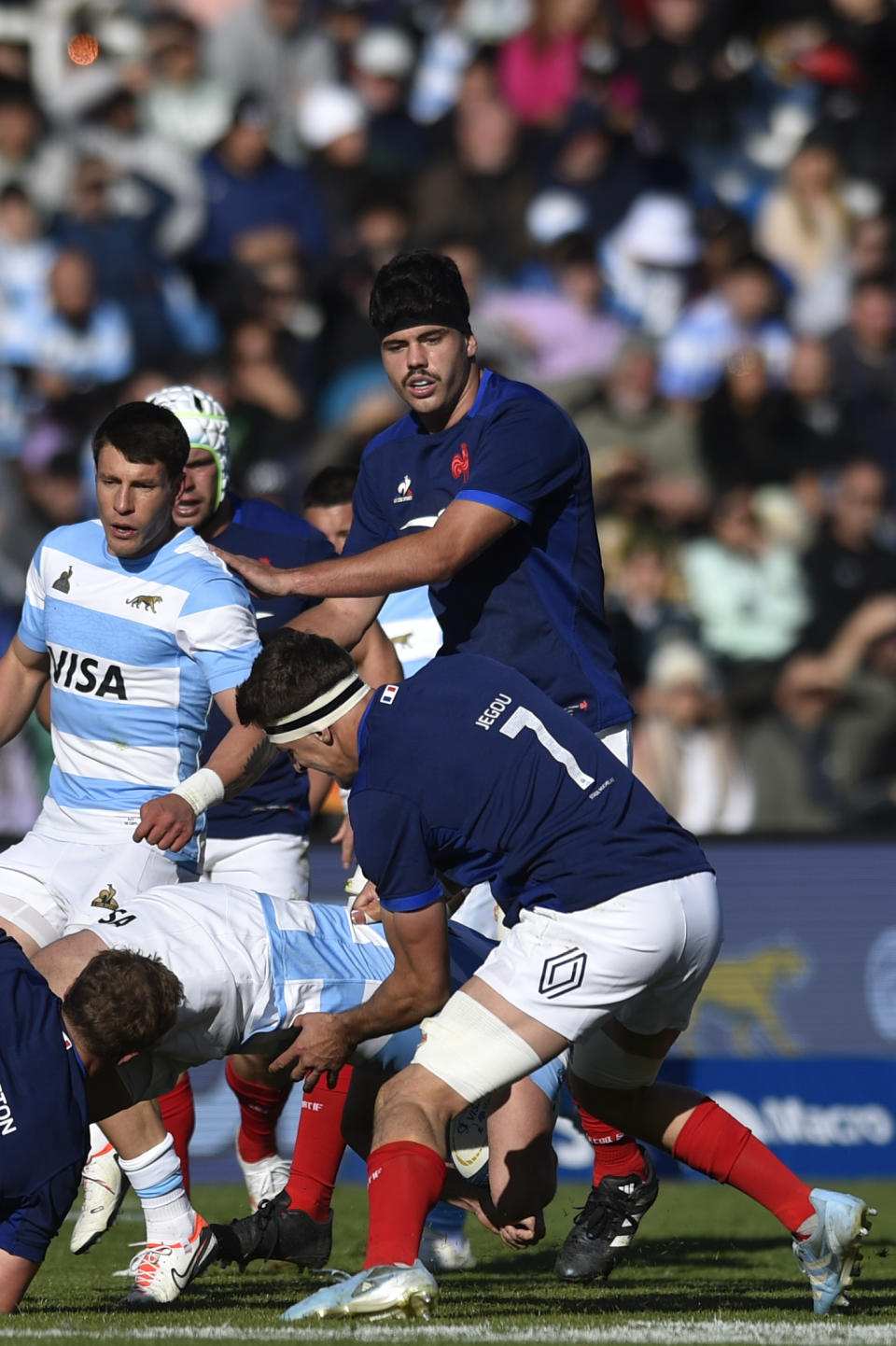 France's Oscar Jegou (7) and France's Hugo Auradou, top right, play a rugby test match against Argentina in Mendoza, Argentina, Saturday, July 6, 2024. (AP Photo/Gustavo Garello)