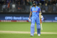 India's Virat Kohli walks from the field after he was dismissed during the T20 World Cup cricket match between the India and South Africa in Perth, Australia, Sunday, Oct. 30, 2022. (AP Photo/Gary Day)