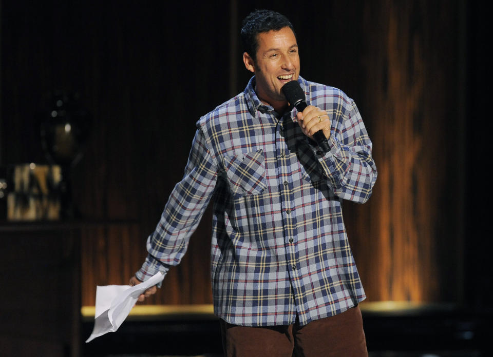 Comedian Adam Sandler performs at "Eddie Murphy: One Night Only," a celebration of Murphy's career at the Saban Theater on Saturday, Nov. 3, 2012, in Beverly Hills, Calif. (Photo by Chris Pizzello/Invision)