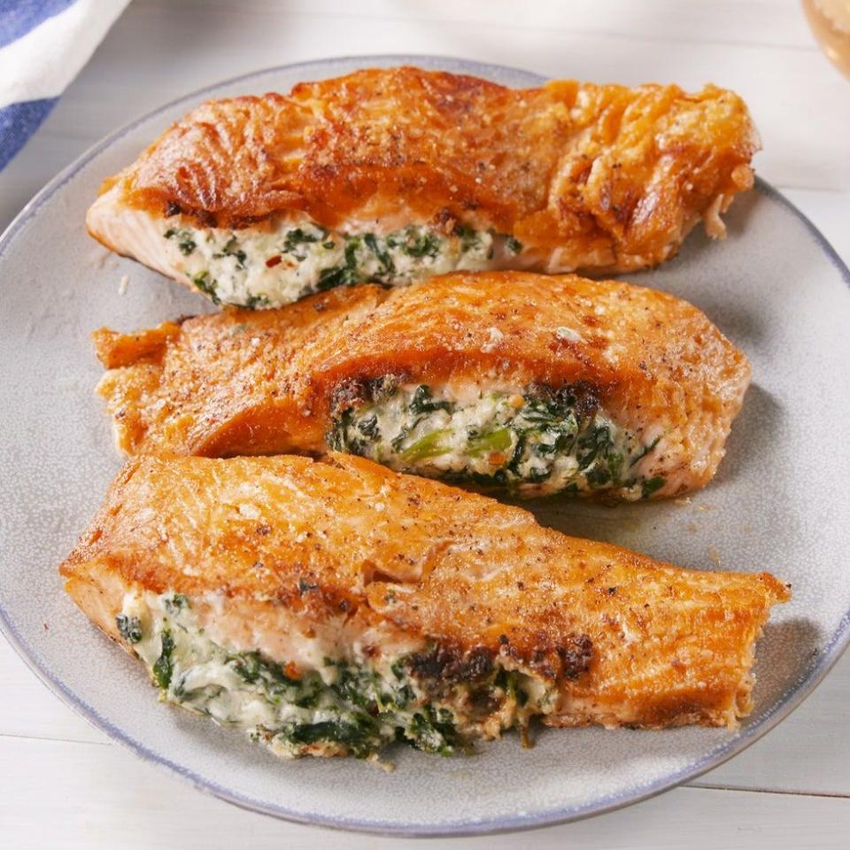 <p>If you're skeptical about the combination of cheese and <a href="https://www.delish.com/uk/cooking/recipes/g36798539/grilled-salmon/" rel="nofollow noopener" target="_blank" data-ylk="slk:salmon;elm:context_link;itc:0" class="link ">salmon</a>, don't be. We promise you, it's AMAZING. </p><p>Get the <a href="https://www.delish.com/uk/cooking/recipes/a35547684/creamed-spinach-stuffed-salmon-recipe/" rel="nofollow noopener" target="_blank" data-ylk="slk:Creamed Spinach–Stuffed Salmon;elm:context_link;itc:0" class="link ">Creamed Spinach–Stuffed Salmon</a> recipe.</p>