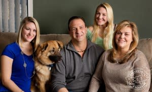 The Cuccio family, from left: Casey, Rob, Samantha and Cheryl at their home. (Their dog's name is Brody.)