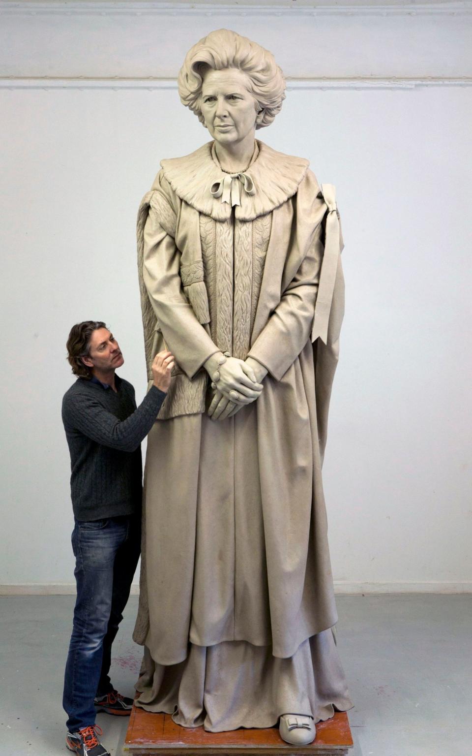 Douglas Jennings working on his statue of Margaret Thatcher -  Douglas Jennings/ PA