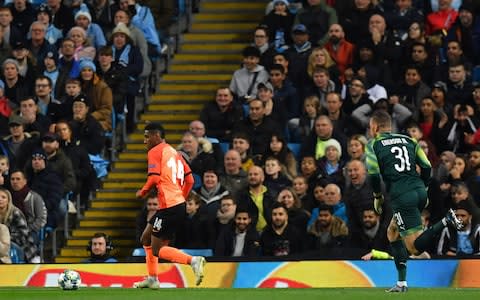 Ederson can only look on in horror - Credit: AFP