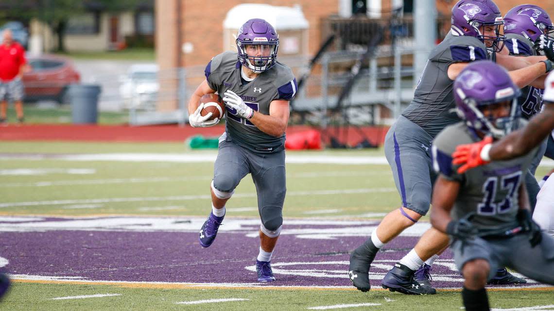 Brady Feldmann takes a handoff upfield during a McKendree University game in the fall 2021. Feldmann, a Highland High School graduate, will be a redshirt junior for the Bearcats this fall and is excited about the upcoming campaign.