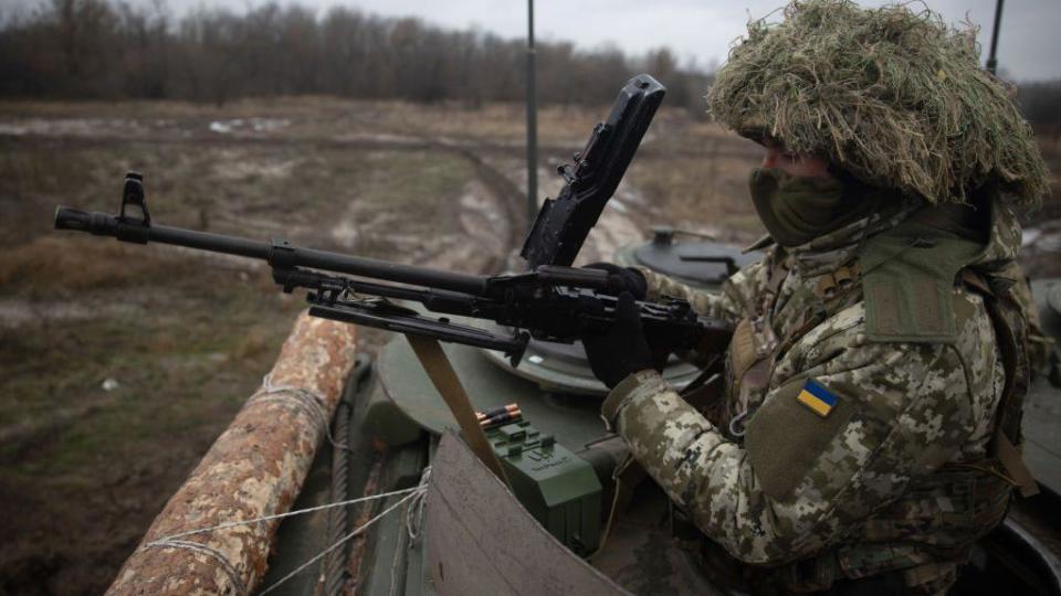 A Ukrainian crew with machine gun looks out from a Marder Infantry Fighting Vehicle (IFV) 1A3 on December 7, 2023