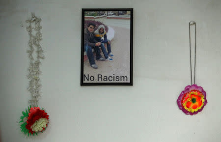 A picture of Mashal Khan hangs on the wall of his bedroom at the family home in Swabi, Pakistan October 24, 2017. Picture taken October 24, 2017. REUTERS/Fayaz Aziz