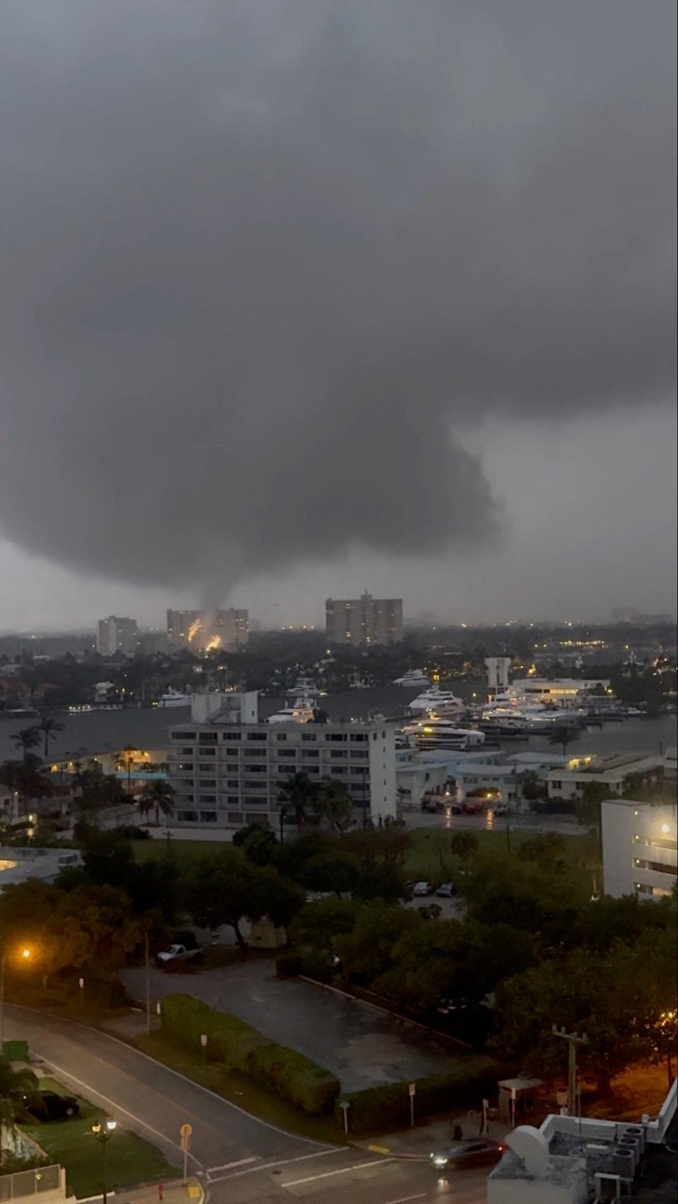 Sparks fly as a tornado touches power cables, in Fort Lauderdale, Florida, U.S (Paul Gallo via REUTERS)