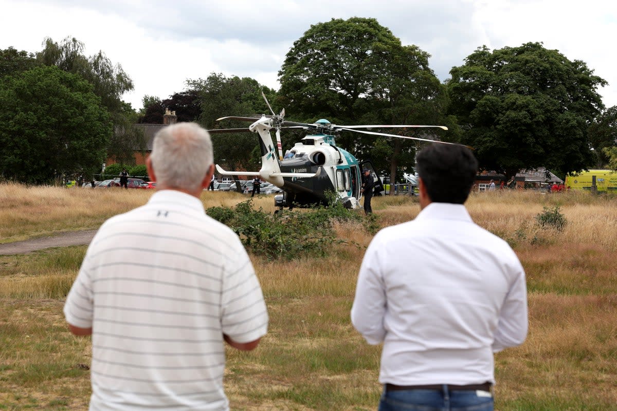 An air ambulance lands on Wimbledon Common as police and emergency services attended the scene of the car crash at the school (Getty Images)