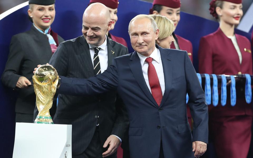 Vladimir Putin and Gianni Infantino - Owen Humphreys/PA Wire