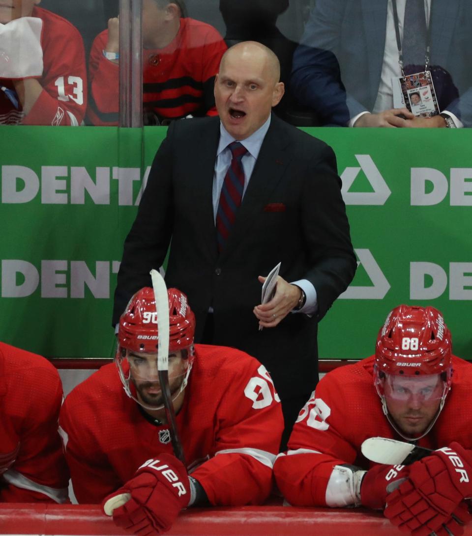 Red Wings coach Derek Lalonde on the bench during the Wings' 6-4 win over the Lightning on Saturday, Oct. 14 2023, at Little Caesars Arena.