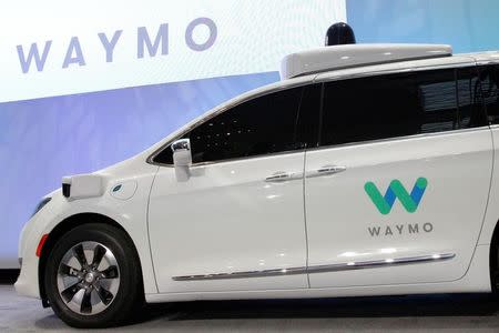 Waymo unveils a self-driving Chrysler Pacifica minivan during the North American International Auto Show in Detroit, Michigan, U.S., January 8, 2017. REUTERS/Brendan McDermid