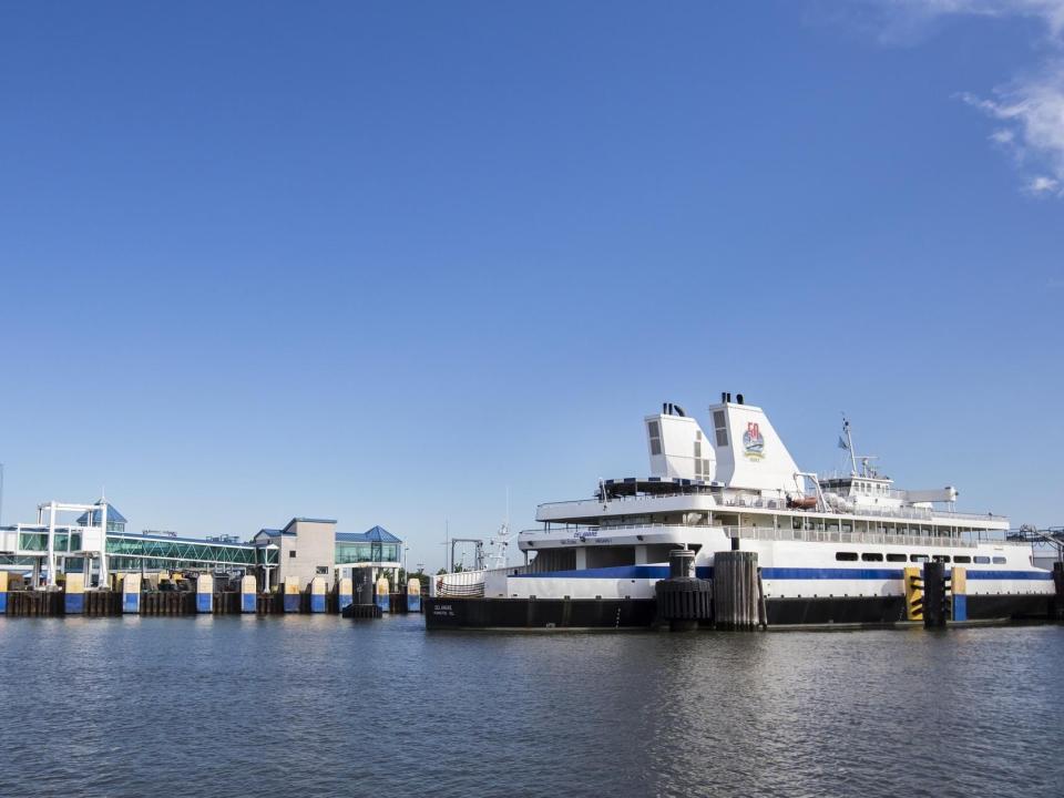 The Cape May-Lewes Ferry sits docked in Cape May, N.J., along the Cape May Canal as seen from the Miss Chris on Sunday, July 17, 2016.