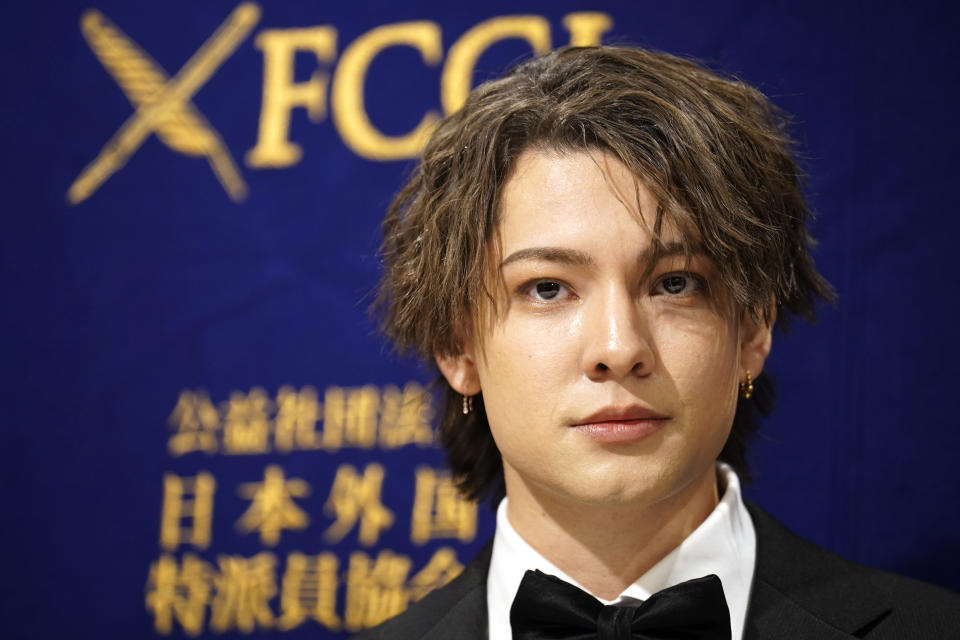 Kauan Okamoto, a musician also a former member of Japanese pop group Johnny's Junior, attends a press conference at the Foreign Correspondents' Club of Japan Wednesday, April 12, 2023, in Tokyo. When Johnny Kitagawa told one of the boys staying at his luxury house to go to bed early, everyone knew “it was your turn.” That was among the recollections shared Wednesday by Okamoto, then 15, about allegedly being sexually assaulted by Kitagawa, a powerful figure in the Japanese entertainment world. (AP Photo/Eugene Hoshiko)