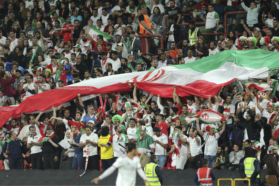 Iranian fans cheer during the AFC Asian Cup round of 16 soccer match between Iran and Oman at Mohammed Bin Zayed Stadium in Abu Dhabi, United Arab Emirates, Sunday, Jan. 20, 2019. (AP Photo/Kamran Jebreili)