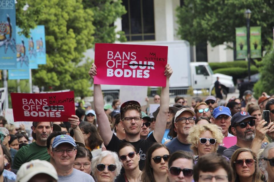 Abortion-rights supporters rally outside the North Carolina Legislative Building in Raleigh, N.C, on Saturday, May 13, 2023, to urge Republican legislators to sustain Democratic Gov. Roy Cooper's veto of new abortion restrictions. (AP Photo/Hannah Schoenbaum)