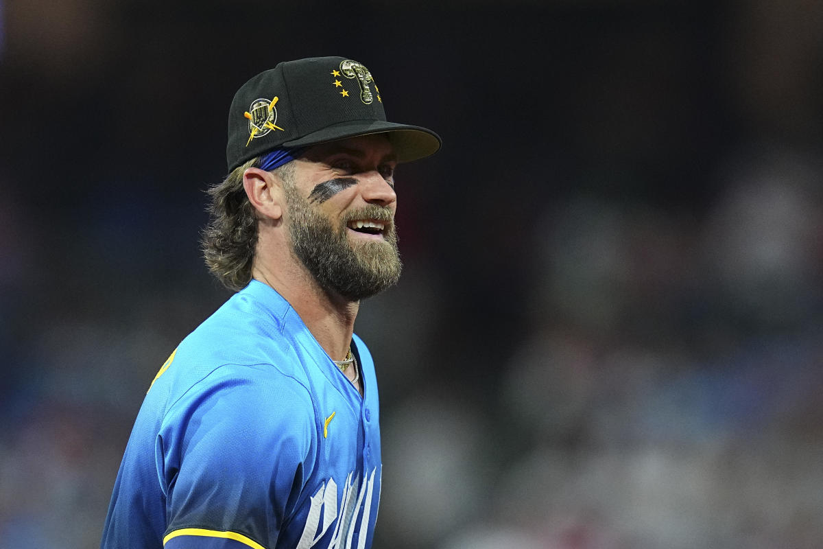 Bryce Harper of the Phillies assists a high school student in securing a prom date