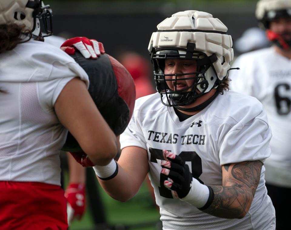 Texas Tech's Cade Briggs does a drill during practice, Friday, Aug. 5, 2022, at the Sports Performance Center.
