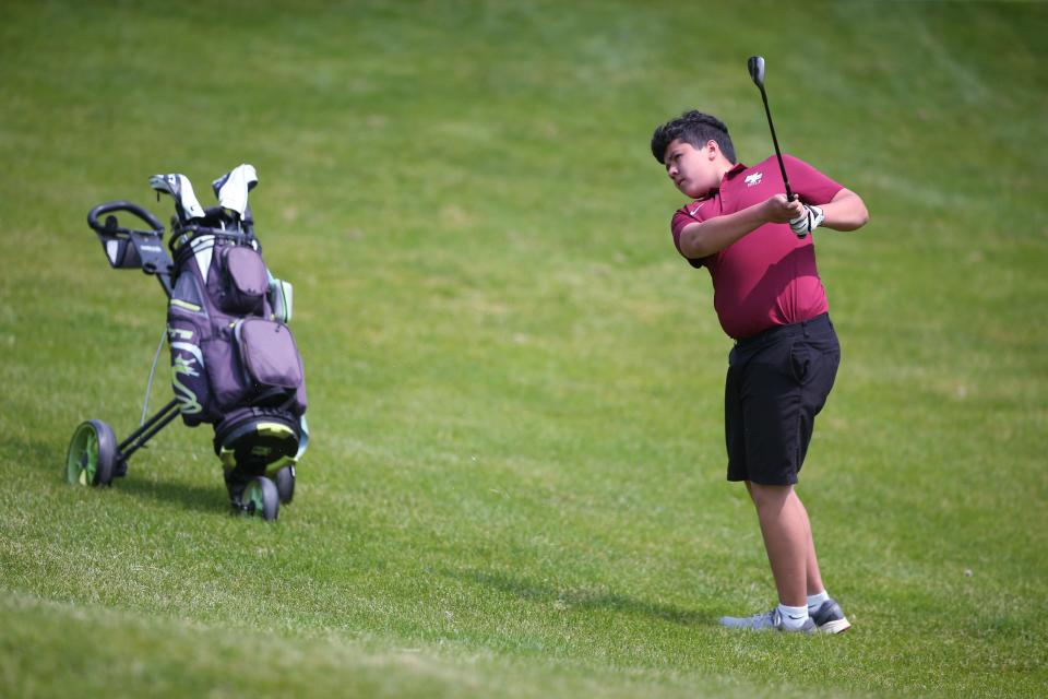 New Paltz's Loyal Goodermote on the 12th hole at the Powelton Club in Newburgh during round 1 of the Section 9 golf championship on May 23, 2023. 