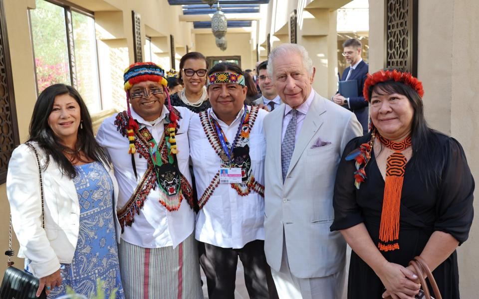 King Charles III and JoÃªnia Wapixana pose at the Commonwealth and Nature reception during COP28