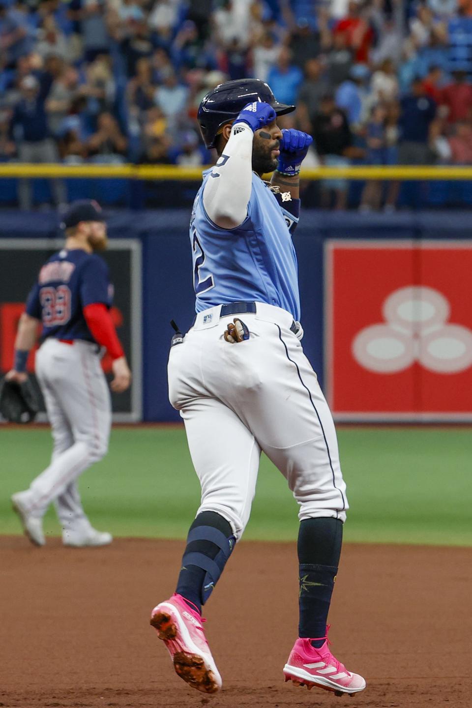 Tampa Bay Rays' Yandy Diaz (2) celebrates a solo home run against the Boston Red in the first inning of a baseball game at Tropicana Field in St. Petersburg, Fla., Thursday, April 13, 2023. (Ivy/Tampa Bay Times via AP)