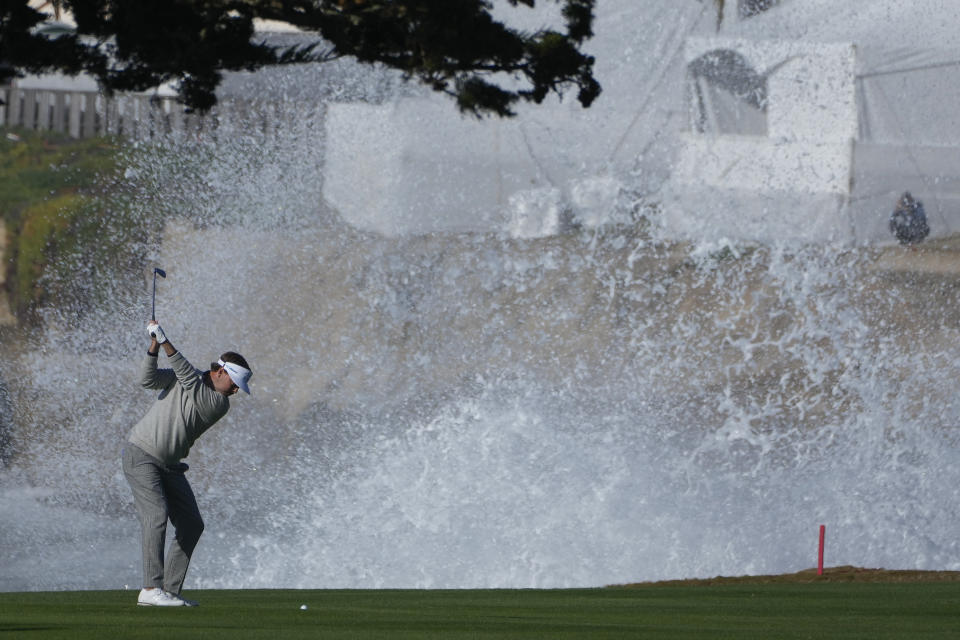 Keith Mitchell prepares to hit a shot from the 18th fairway of the Pebble Beach Golf Links during the fourth round of the AT&T Pebble Beach Pro-Am golf tournament in Pebble Beach, Calif., Monday, Feb. 6, 2023. (AP Photo/Godofredo A. Vásquez)