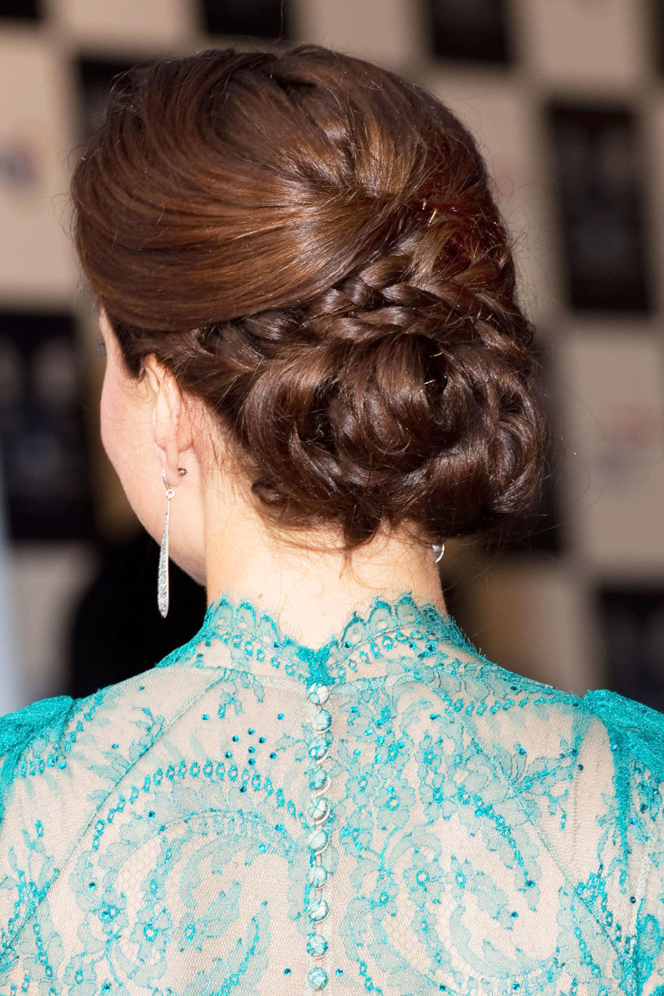 <p>A half-up, braid, and low bun all in one. </p>