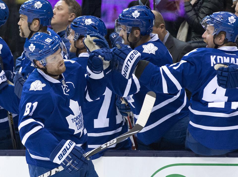 Toronto Maple Leafs forward Phil Kessel (81) celebrates his goal against the Boston Bruins during the first period of an NHL hockey game Wednesday, Nov. 12, 2014, in Toronto. (AP Photo/The Canadian Press, Nathan Denette)