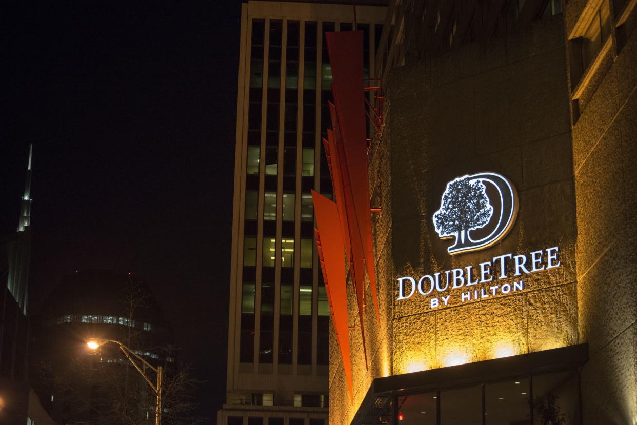 Nashville, Tennessee, USA - April 5, 2013: The DoubleTree Hotel and other buildings at night in downtown Nashville