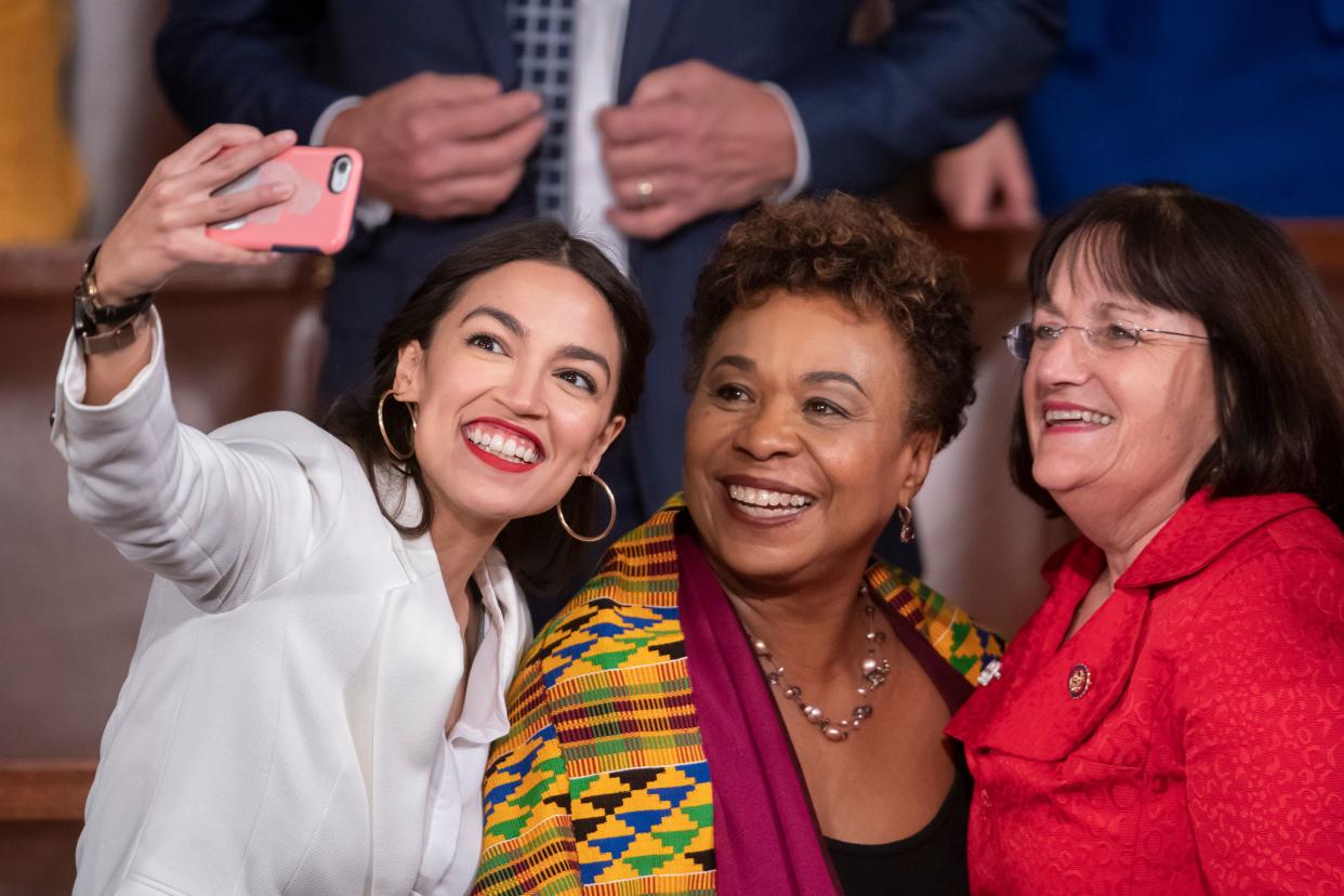 Rep. Alexandria Ocasio-Cortez (D-N.Y.) takes a selfie with Rep. Ann McLane Kuster (D-N.H.) and Rep. Barbara Lee (D-Calif.) on the first day of the 116th Congress. (ASSOCIATED PRESS)