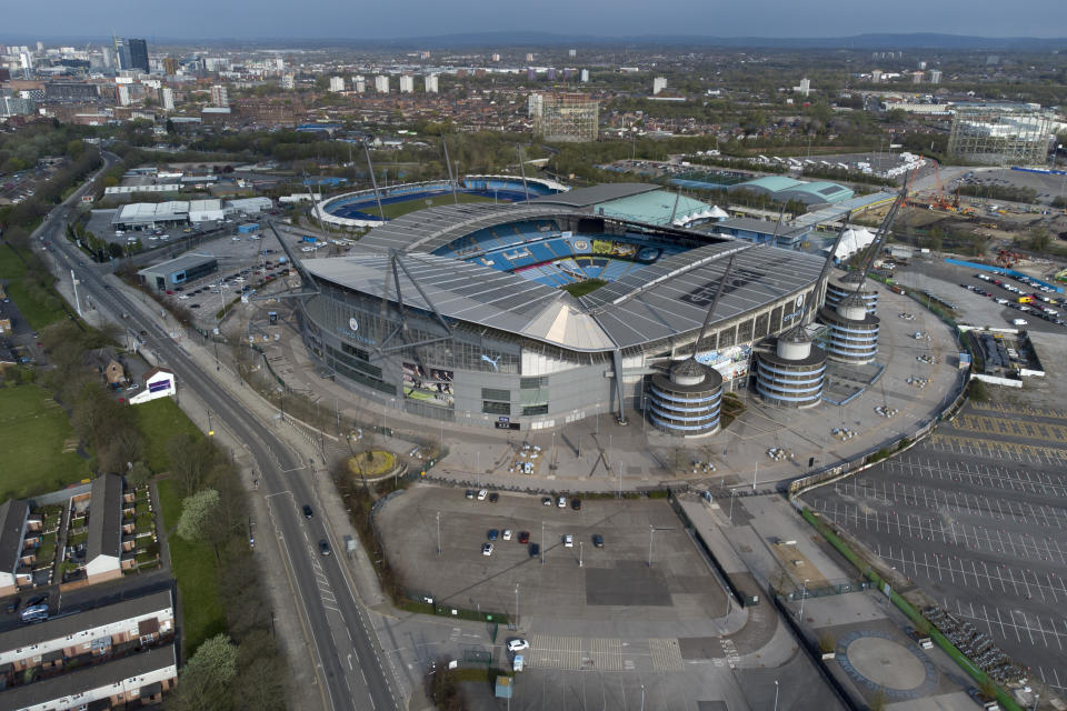 Manchester City's Etihad Stadium is seen after the collapse of English involvement in the proposed European Super League, Manchester, England, Wednesday, April 21, 2021. Manchester City were the first club to pull out after Chelsea had signalled their intent to do so by preparing documentation to withdraw. (AP Photo/Jon Super)